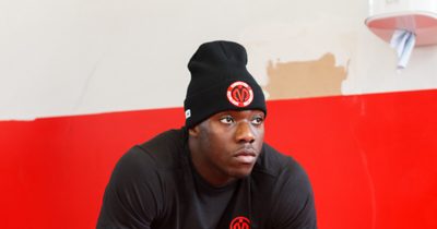 MEM Fitness activewear: black tee, beanie and lifting gloves with embroidered MEM logo